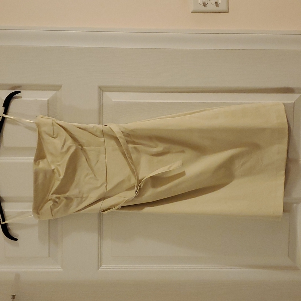 H&M US size 4 linen colored strapless dress with matching belt.